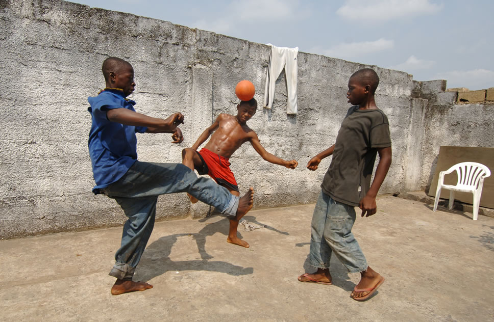 African Children Playing Football