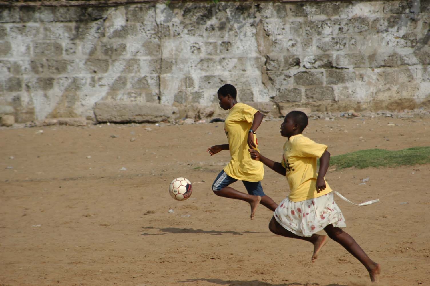 African Children Playing Football