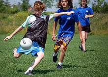 Children Playing Football In Street