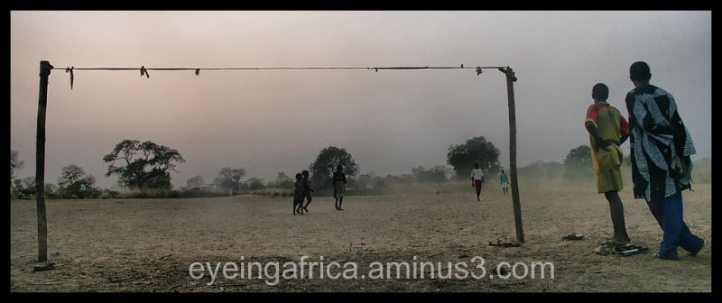 Children Playing Football In Street