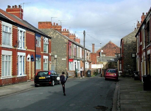 Children Playing Football In Street