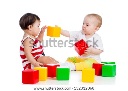 Children Playing Together With Toys