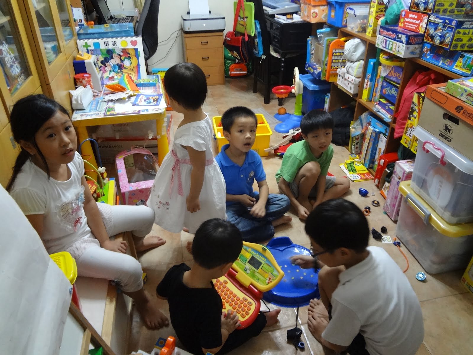 Children Playing Together With Toys